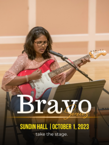 Guitar student performs onstage a Sundin Hall during Minnesota School of Music Bravo Concert